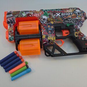 X-Shot Skins XCESS blaster – dual drums, 8 darts